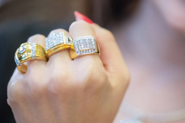 Woman wearing platinum and yellow gold jewelry together